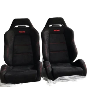 A PAIR OF SR3 RACING SEATS MADE OF BLACK SUEDE MATERIAL