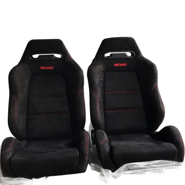 A PAIR OF SR3 RACING SEATS MADE OF BLACK SUEDE MATERIAL